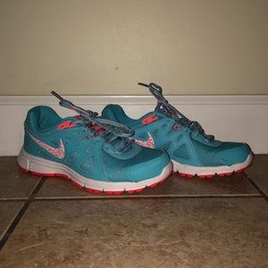 Nike Revolution 2 in blue and coral
